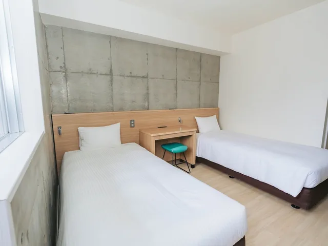 غرفة قياسية بسريرين منفصلين بغرفتي نوم، The Breakfast Hotel Marche Ishigakijima 1/7