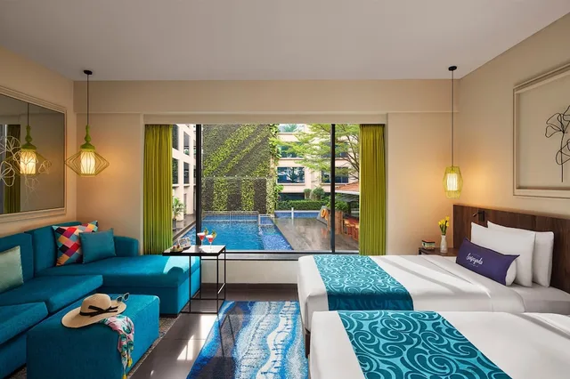 غرفة بسريرين منفصلين بإطلالة على المسبح مع أريكة، Hyatt Centric Candolim Goa 5/10