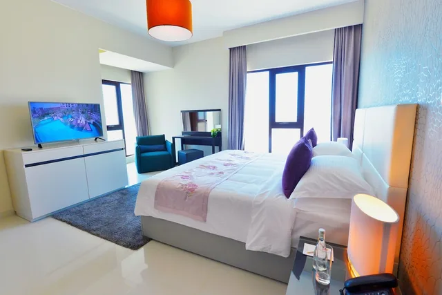 شقة ديلوكس بسرير كينج وسريرين منفصلين بغرفتي نوم بإطلالة جزئية على البحر، Lagoona Beach Luxury Resort And Spa 3/5