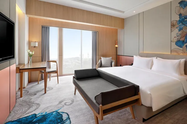 غرفة ديلوكس بسرير كينج وسرير كوين، Mercure Samarinda 2/6
