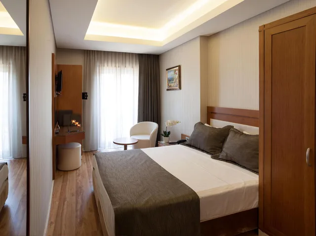 غرفة بسرير مزدوج وسريرين منفصلين، Sorriso Hotel 1/1