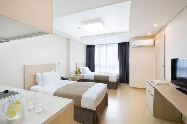 غرفة سوبيريور بسريرين منفصلين، Crown Harbor Hotel Busan 1/2