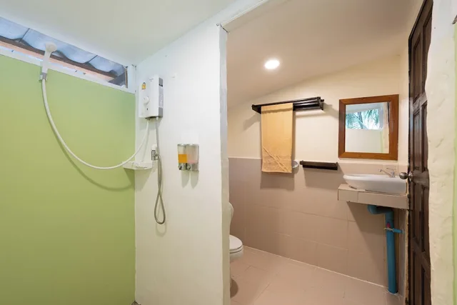 غرفة ديلوكس ثلاثية بسرير كوين وسرير فردي، Mook Lanta Boutique Resort Spa 4/4
