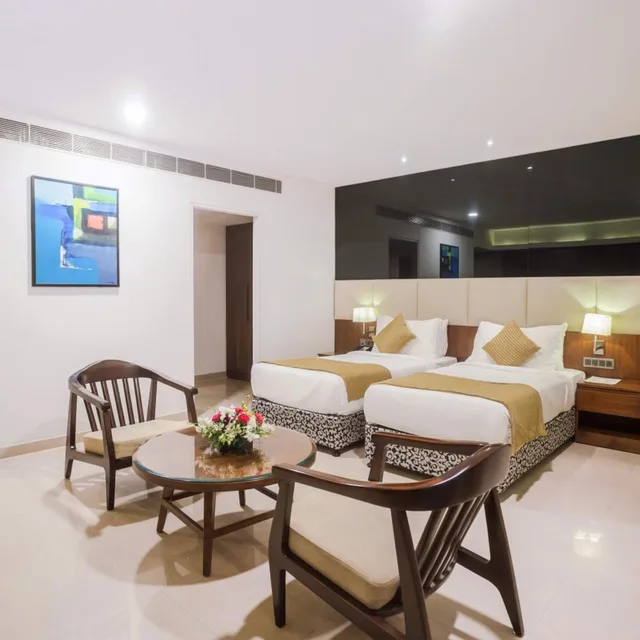 Premium, Twin Beds, THE RAVIZ CALICUT 2/4