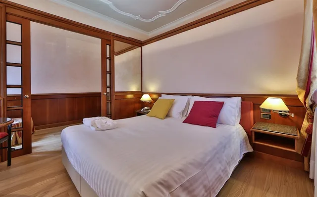 غرفة سوبيريور بسرير كوين وسرير فردي للمدخنين، Best Western Hotel Moderno Verdi 2/5