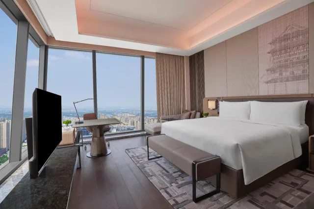 جناح تنفيذي تنفيذي بسرير كينج بإطلالة على المدينة مع دخول الصالة، JW Marriott Hotel Xi'an 4/8