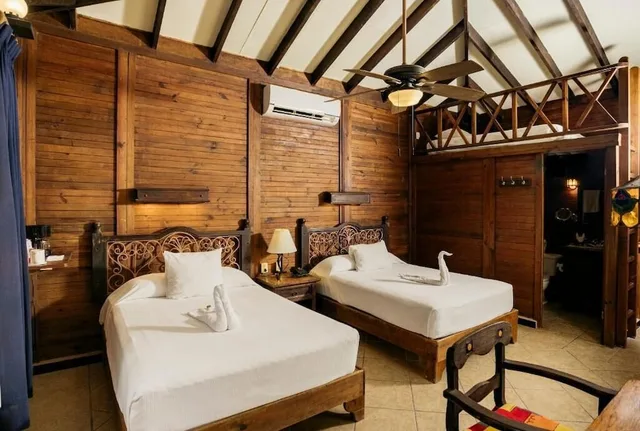 Palm, Beach, Bungalow, 2 Double Beds, 3 Double Beds, Petit Lafitte Hotel 5/9