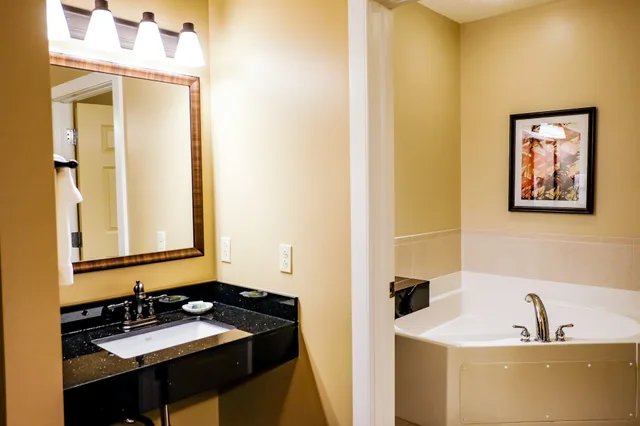 Suite, King Bed, Sofa, Jetted Tub, Best Western Plus Dutch Haus Inn And Suites 6/7