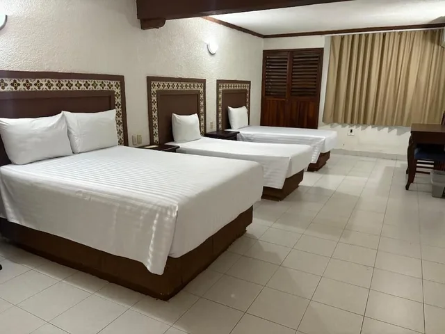 غرفة سوبيريور ثلاثية بسرير مزدوج وسريرين منفصلين، Suites Cancun Center 2/6