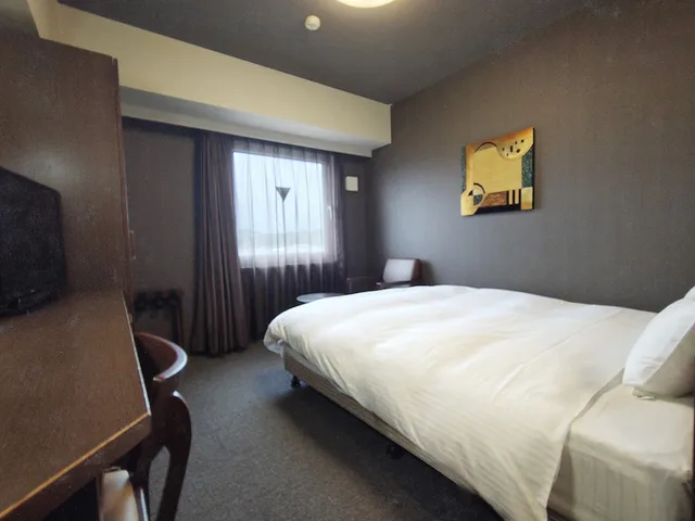غرفة بسرير كوين في المبنى الرئيسي للمدخنين، Hotel Route-Inn Iwakiizumi Ekimae 3/8