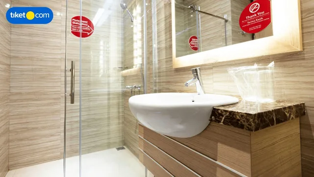 غرفة ديلوكس بسرير كينج، Grand Citihub Hotel at Panakkukang 4/4