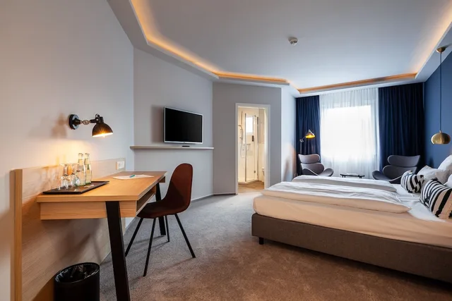 غرفة كومفورت ثلاثية بسرير كوين مع أريكة، Hotel Wittorf 1/3