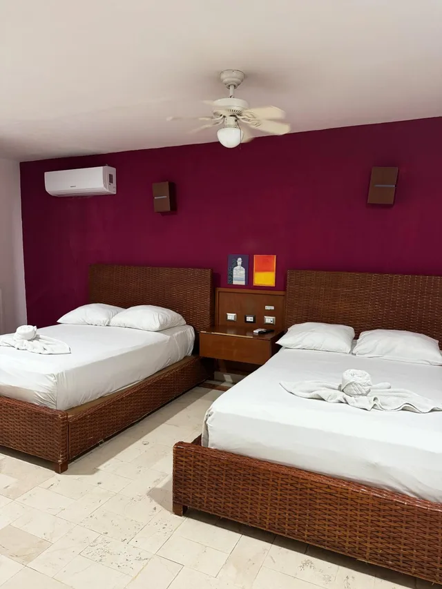 غرفة رباعية بسرير مزدوج، Illusion Hotel Boutique 1/5