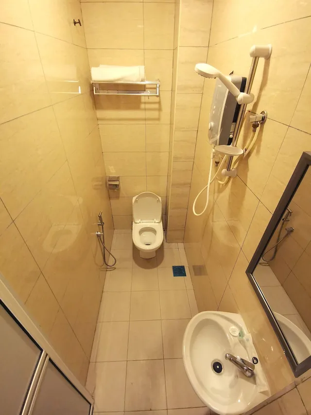 غرفة ديلوكس ثلاثية بسرير كينج وسرير فردي، The Core Hotel 4/4
