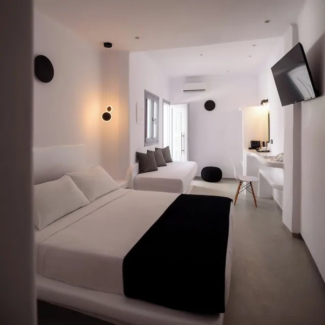 غرفة ديلوكس ثلاثية بسرير مزدوج مع أريكة، Tataki Hotel 6/10
