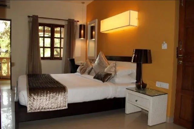 غرفة قياسية بسرير مزدوج أو سريرين منفصلين، COCONUT GROVE BEACH RESORT 1/2