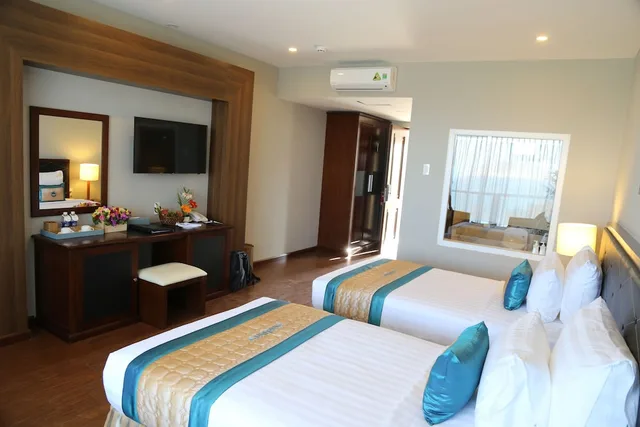 غرفة ديلوكس بسريرين منفصلين بإطلالة على الحديقة، Sandunes Beach Resort Spa 3/8