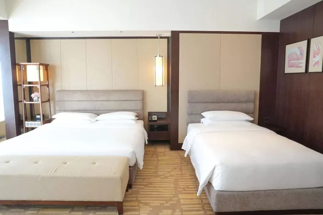 غرفة ديلوكس بسريرين منفصلين وسرير كينج، Hyatt Regency Qingdao 2/3