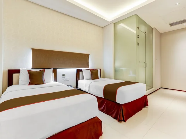 غرفة ديلوكس بسريرين منفصلين، Collection O at Jalan Padma near Legian Beach 3/5