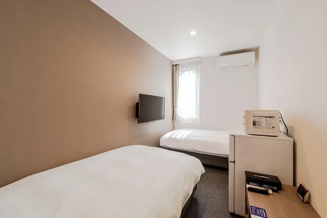 غرفة بسريرين منفصلين، HOTEL R9 The Yard Yatsushiro 1/3
