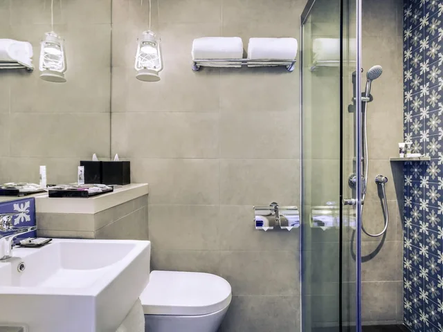 غرفة بريفيليج بسرير كينج، Mercure Singapore On Stevens 10/10