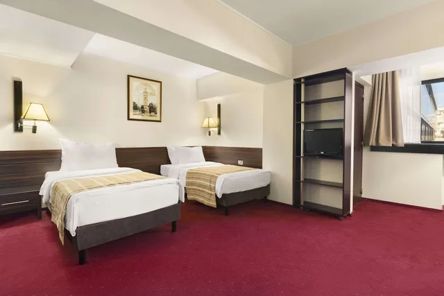 غرفة بسريرين منفصلين، Ramada by Wyndham Iasi City Centre 1/3