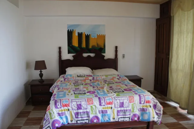 غرفة قياسية رباعية بسرير مزدوج وسريرين منفصلين، Plaza Real Resort 1/3