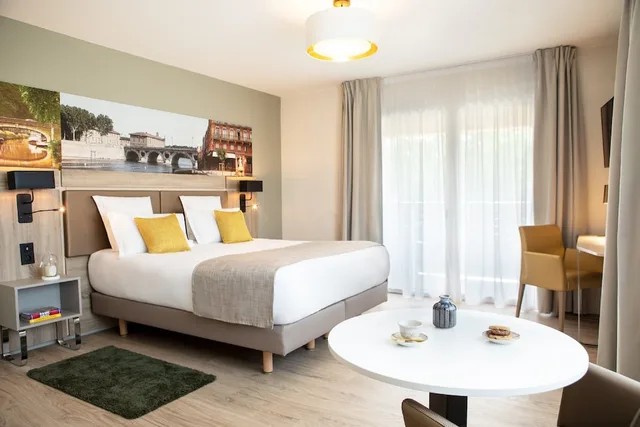 شقة بسرير مزدوج وسريرين منفصلين، Residhome Toulouse Ponts Jumeaux 1/3