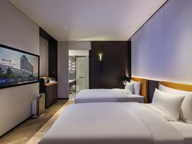 غرفة ديلوكس بسريرين منفصلين، Novotel Xian Xixian 1/9