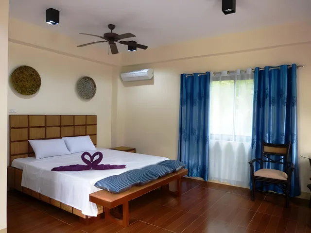 غرفة ديلوكس بسرير كينج بشرفة، Sulusea Boutique Hotel 1/1