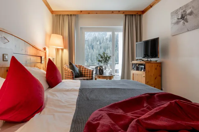 غرفة ديلوكس بسرير مزدوج أو سريرين منفصلين، Robinson Club Arosa 5/9
