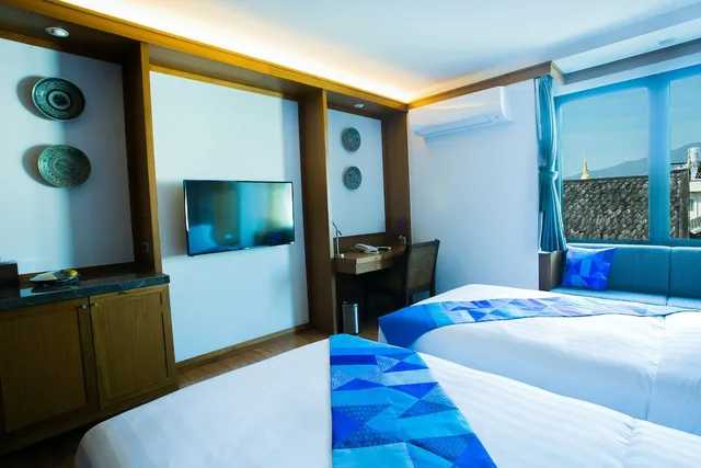 غرفة ديلوكس بسريرين منفصلين وسرير كينج، Lavana Hotel Chiangmai 1/4