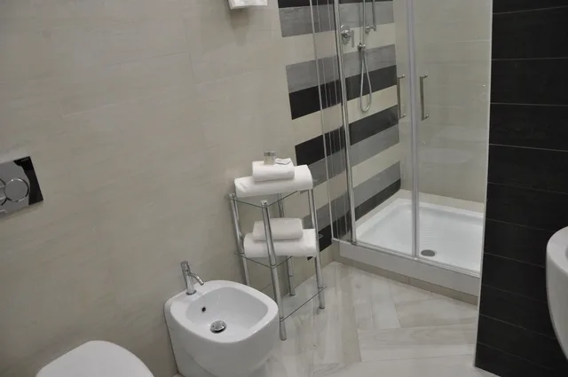 Room, Triple, 1 Double and 1 Single Bed, Il Corso Suite 1/3
