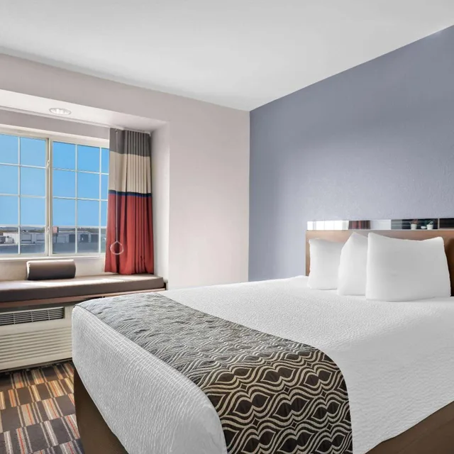 غرفة بسرير كوين بحوض استحمام لذوي الإعاقة، Microtel Inn And Suites By Wyndham Sweetwater 5/10