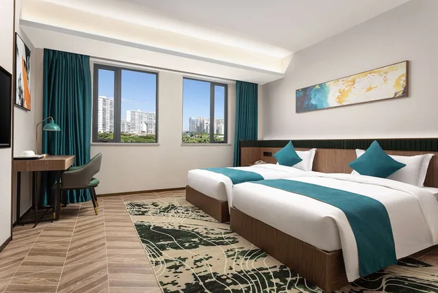 غرفة ديلوكس بسريرين منفصلين بإطلالة على المدينة، Days Inn by Wyndham Hainan Sanya Bay 1/1