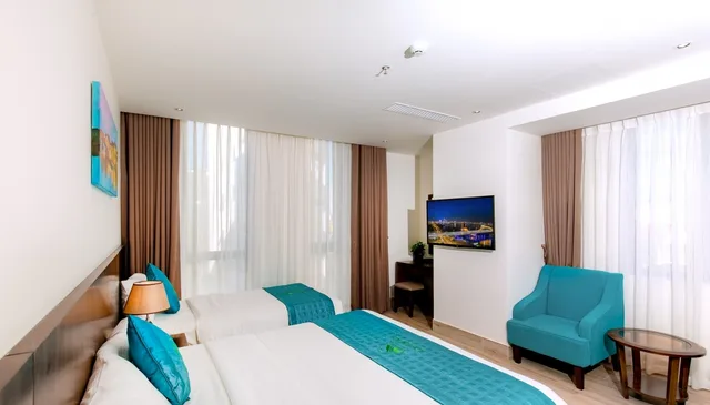 غرفة ديلوكس ثلاثية، Greenery Hotel 2/2
