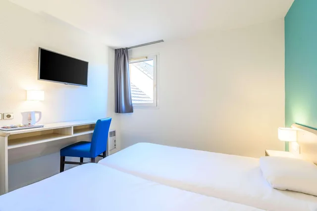 غرفة بسريرين منفصلين، Comfort Hotel Orleans Saran 1/2