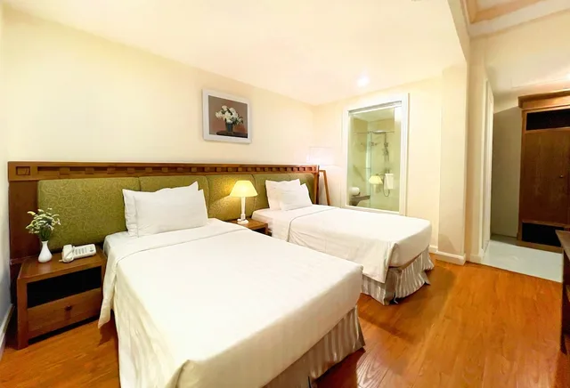غرفة سوبيريور رباعية بسرير كوين وسريرين منفصلين، Phoenix Hotel Vung Tau 8/10
