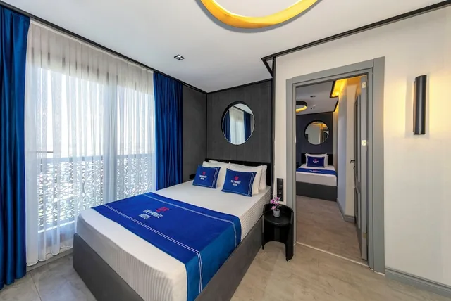 غرفة ديلوكس رباعية بسرير كوين وسريرين منفصلين، The Private Airport Hotel 2/7