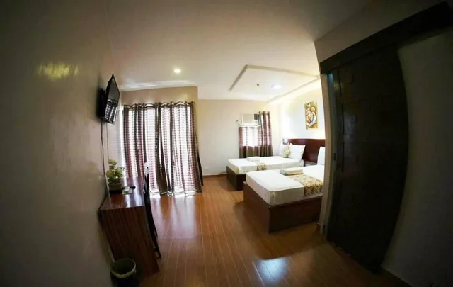 غرفة ديلوكس رباعية بسريرين مزدوجين، Rovic Apos S Tourist Hotel 2/3