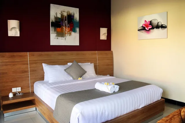 غرفة ديلوكس ثلاثية بسرير كينج وسرير فردي، Bali Dive Resort And Spa 1/2