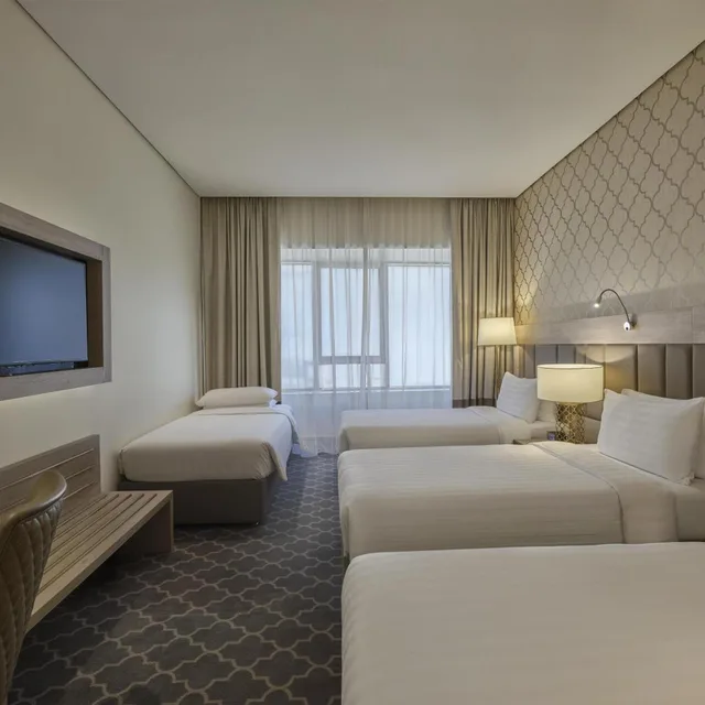 غرفة رباعية بسرير مزدوج، فندق ورقان العزيزية للخدمات الفندقية(DoubleTree by Hilton Makkah Aziziyah) 1/2
