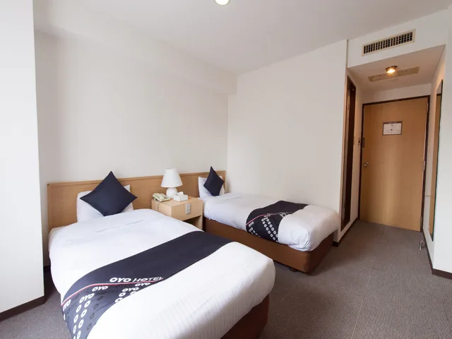 غرفة قياسية بسريرين منفصلين، Tabist Sasebo Palace Hotel 1/5