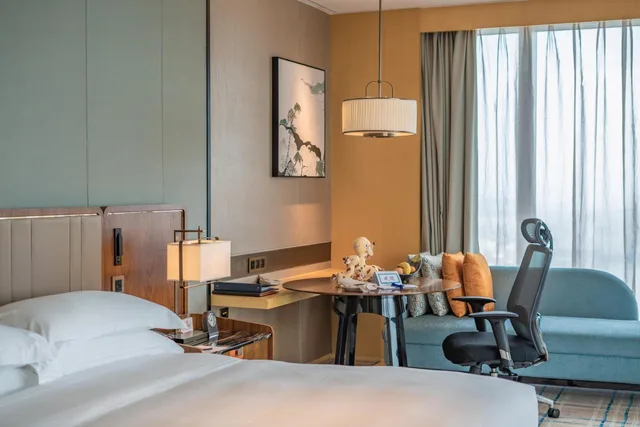 غرفة ديلوكس بسرير كينج وسرير كوين، Hilton Fuzhou 4/5