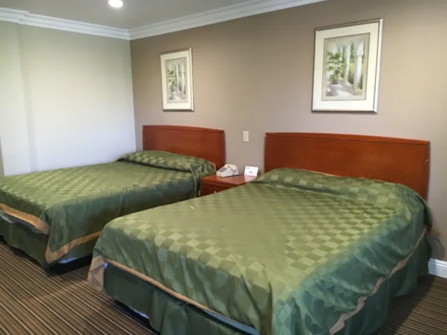 غرفة قياسية بسريرين كوين، Regency Inn And Suites 1/2
