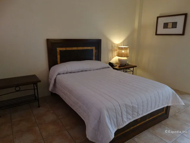غرفة ديلوكس بسرير كوين، Citystate Asturias Hotel Palawan 6/10