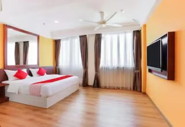 غرفة بريميوم بسرير كينج، Collection O Hotel Super Cowboy 2/5