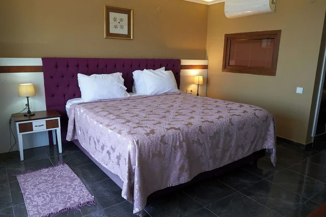 غرفة سوبيريور بسرير كوين بإطلالة على البحر، Phellos Suites 1/2