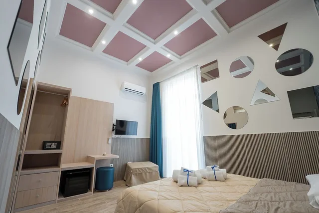 جناح استوديو حصري بسرير كوين بجاكوزي في الملحق، B&B Le 4 Stagioni Dante's Suites 2/3