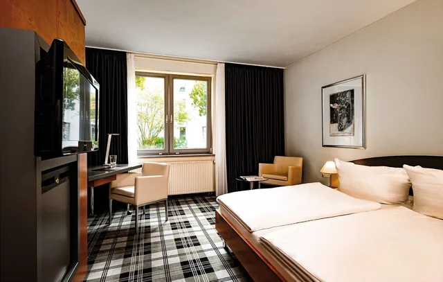 غرفة قياسية بإطلالة على الفناء مفردة بسرير كوين، MEDIAN HOTEL HANNOVER LEHRTE 1/9